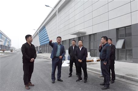 覃振華到江蘇、安徽兩地調研市場經營